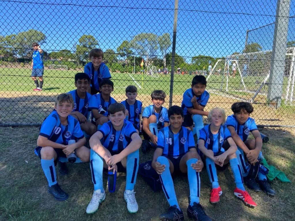 Hills Spirit junior team together at the ground